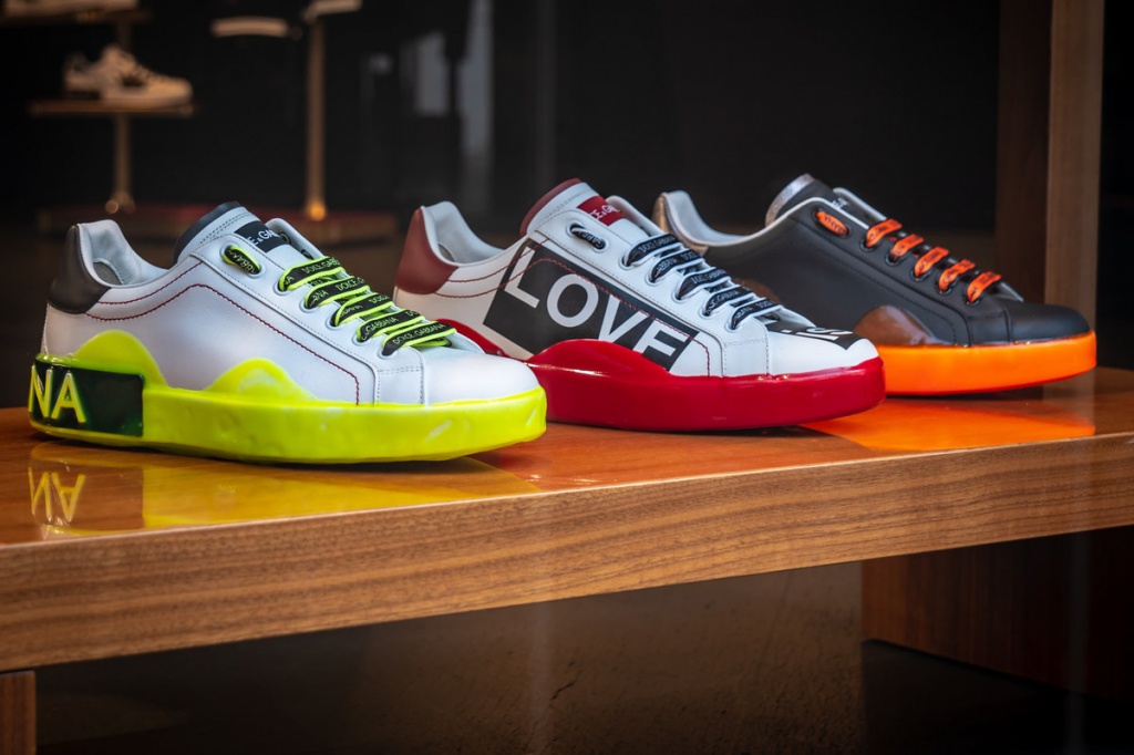 three-unpaired-multicolored-leather-sneakers-on-display-2300334.jpg